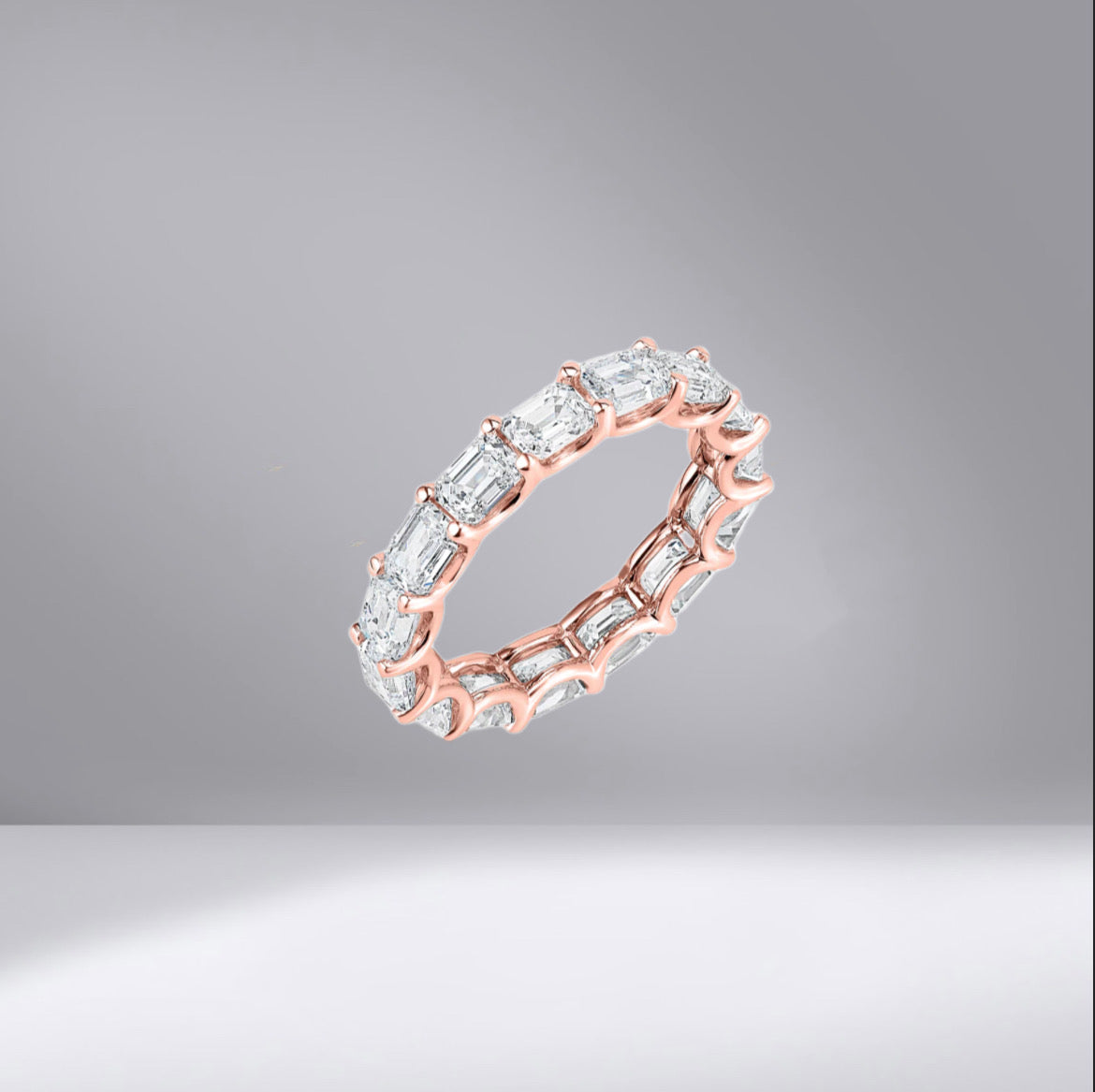 East-West Emerald Eternity Ring with rose gold ring